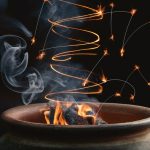 glowing poker illuminates smoke