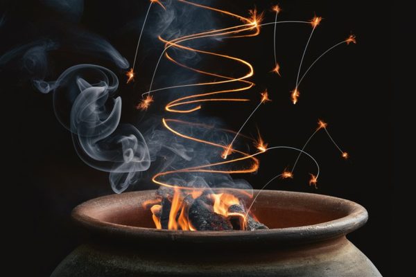 glowing poker illuminates smoke